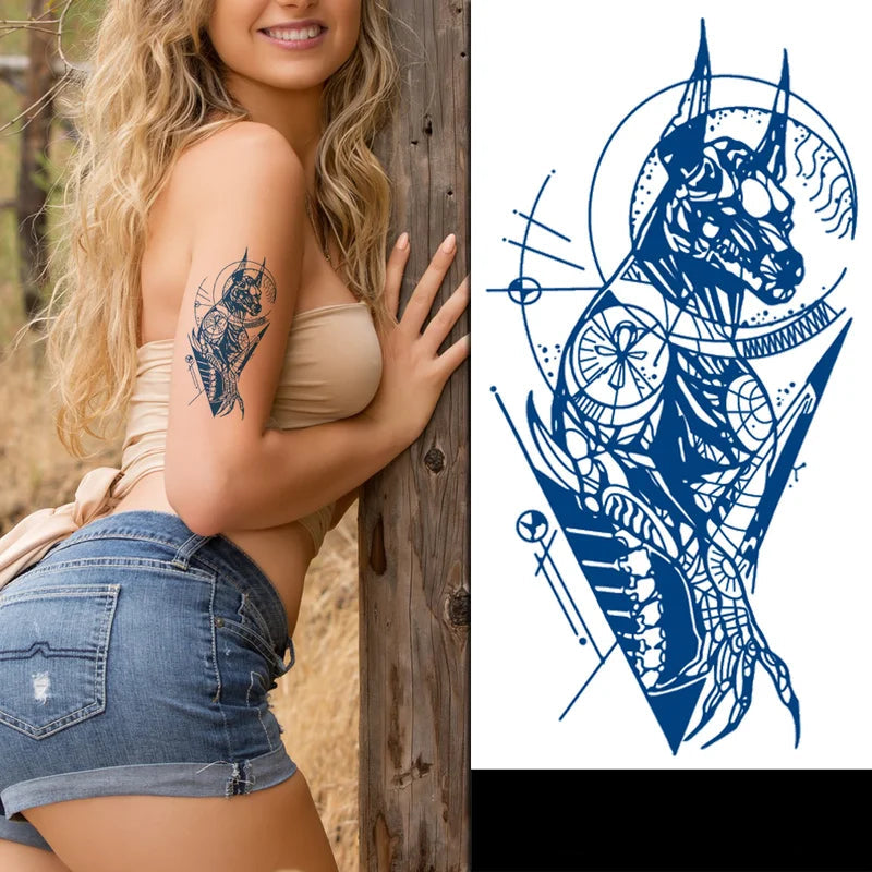 Anubis Tattoo design placed on female models arm
