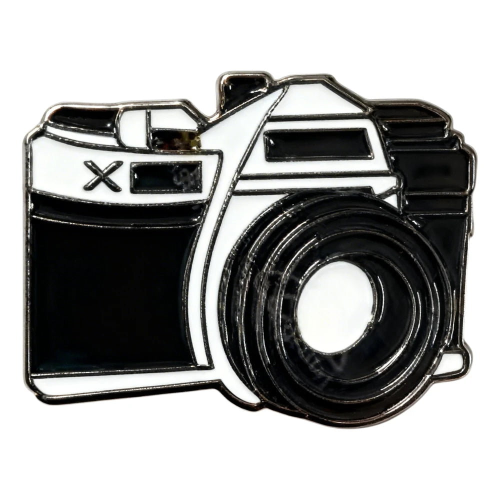 Camera-shaped badge on a white background