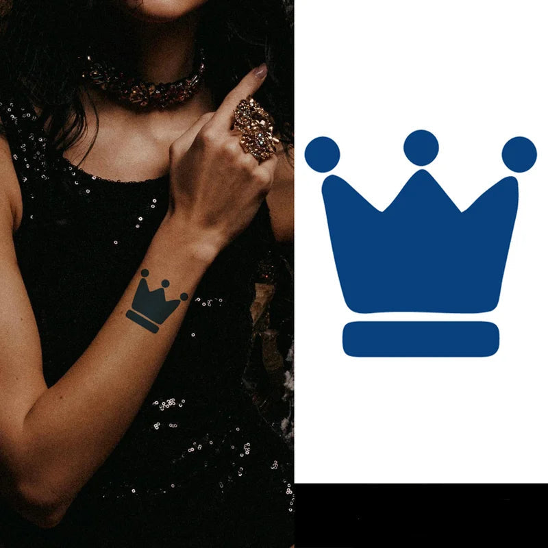 crown semi permanent tattoo on a girls arm