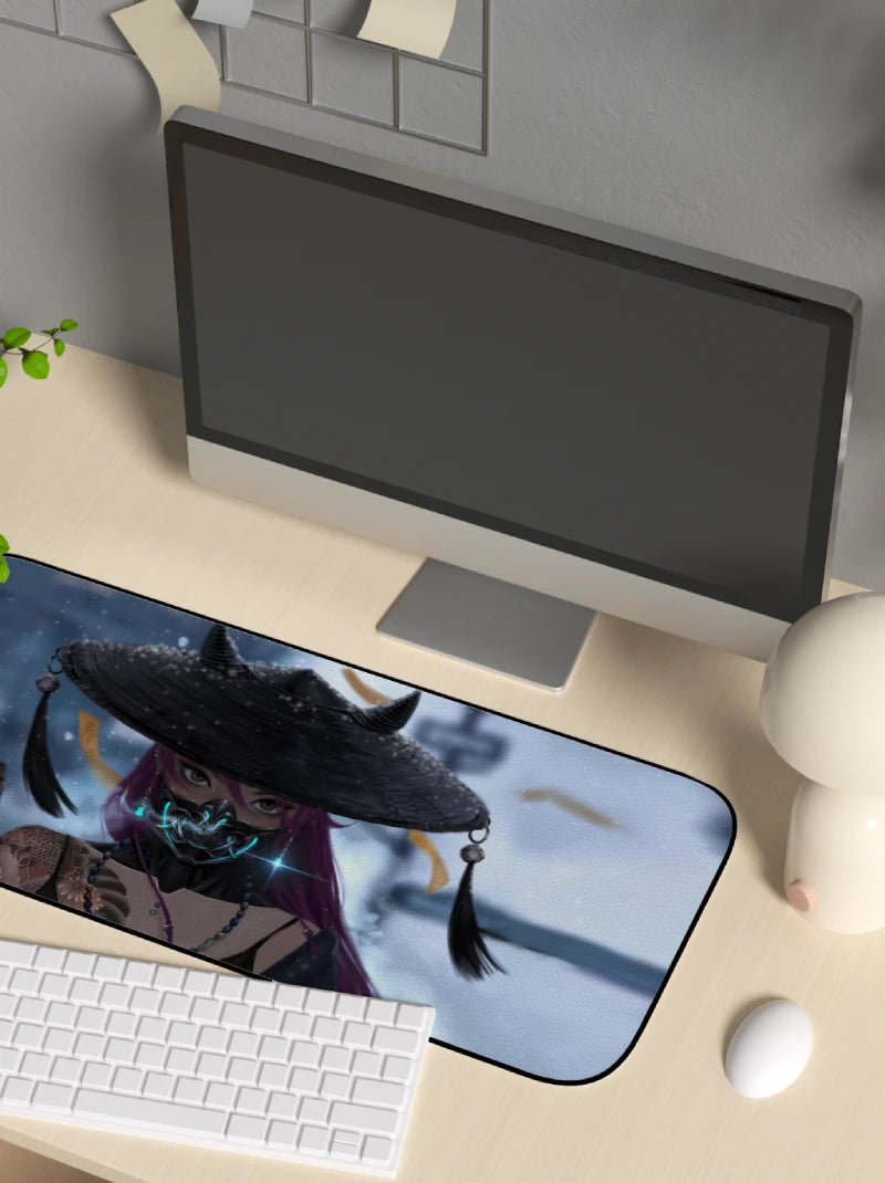 Desk setup with a computer monitor, keyboard, and mouse on a desk with a decorative japanese cyberpunk samurai mouse pad.
