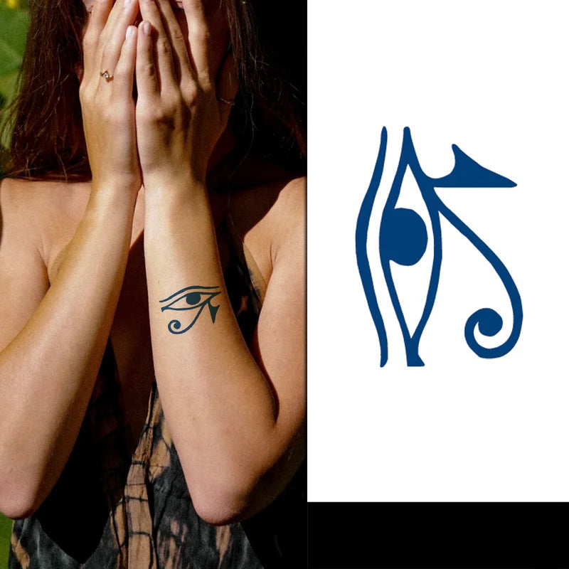 Person with an eye tattoo on their arm next to a blue hieroglyphic symbol
