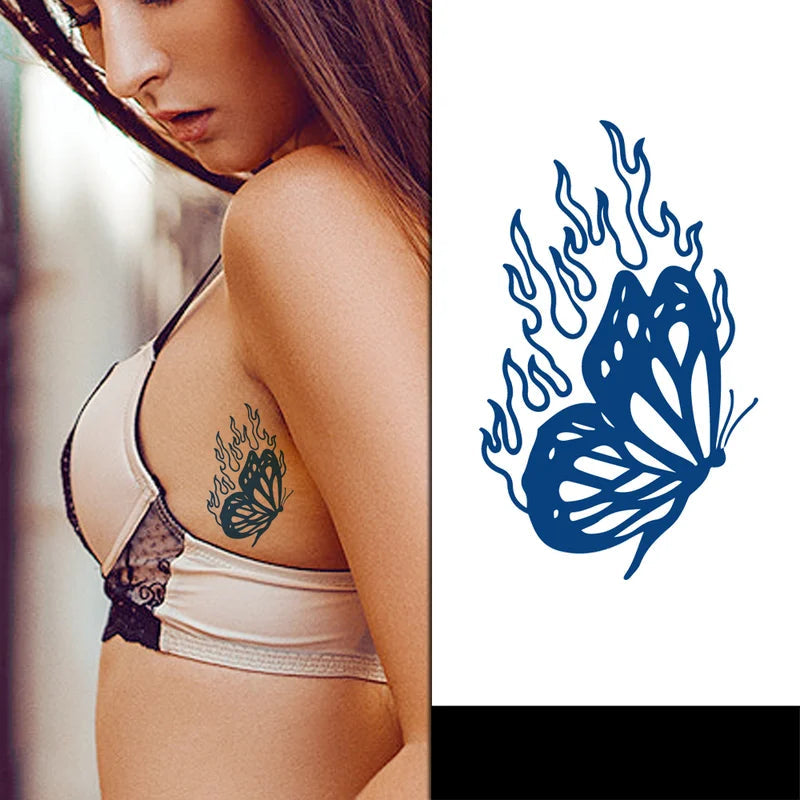 Woman with a butterfly tattoo on her shoulder next to a blue butterfly design