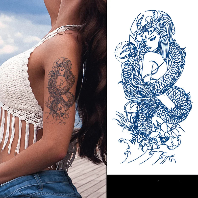 woman with a jagua tattoo of a goddess with a dragon wrapped around here like a scarf