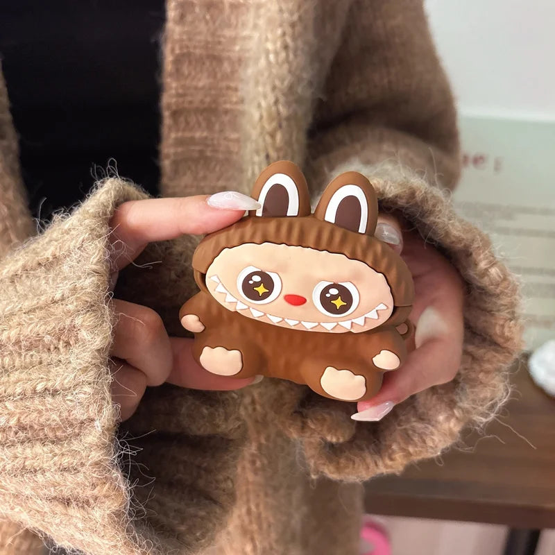 Person holding a cute brown animal-shaped phone case with a neutral background