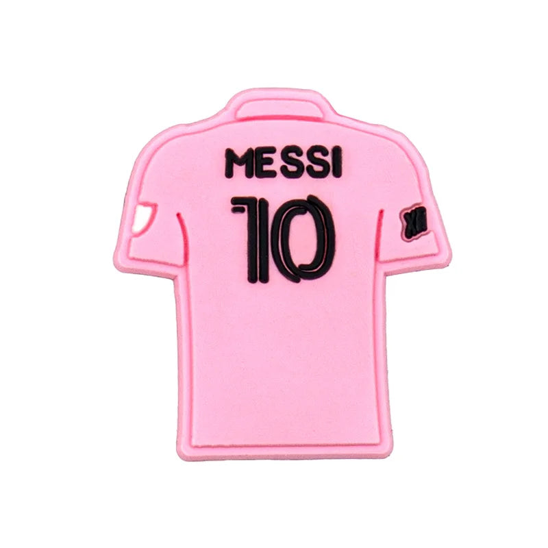 Pink soccer jersey with 'Messi 10' croc charm on a white background