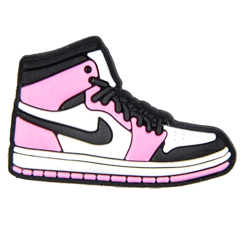 Pink and black sneaker with white accents on a white background