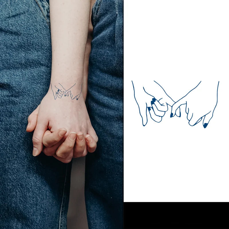 Two hands holding each other with a tattoo of two hands on a person's wrist, next to a line drawing of the same tattoo design.