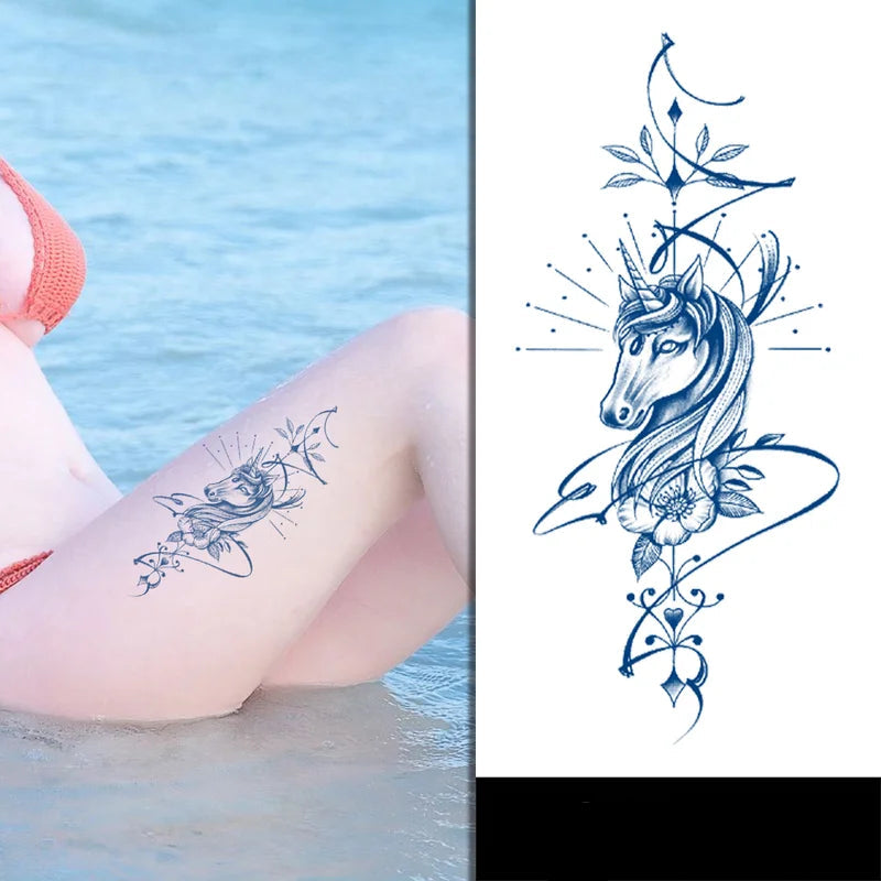 Unicorn tattoo design on a person's leg with water and pink float in the background