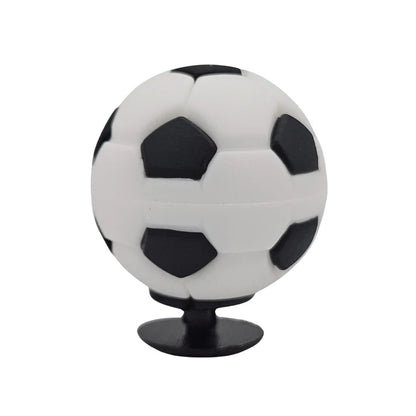 Soccer ball-shaped phone stand on a white background