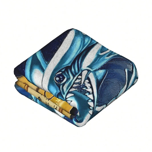 Folded blanket with dragon design on a white background