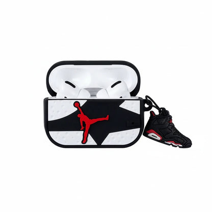AirPods case with Jordan logo and a black sneaker on a white background