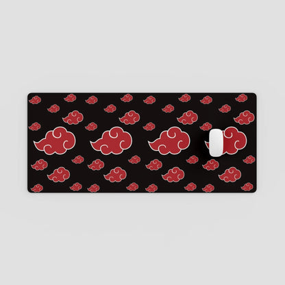Black mouse pad with red cloud pattern on a light gray background