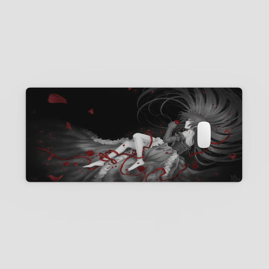 Phone case with a dark design featuring a character in a flowing dress on a light gray background