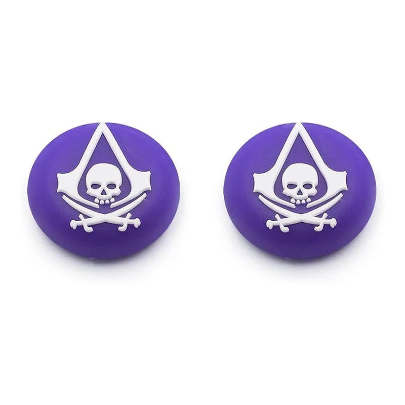 Two purple buttons with white skull and crossbones design on a white background