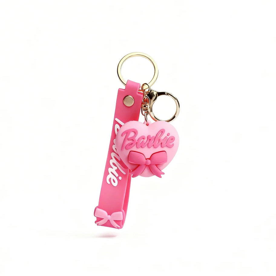 Pink keychain with 'Barbie' branding on a white background