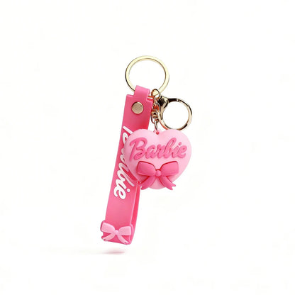 Pink keychain with 'Barbie' branding on a white background