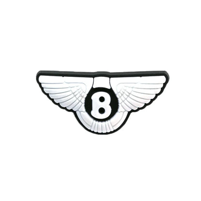 Bentley logo with wings croc charm on a white background