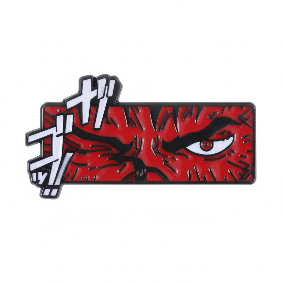 Red and black rectangular enamel pin with a stylized eye design on a white background