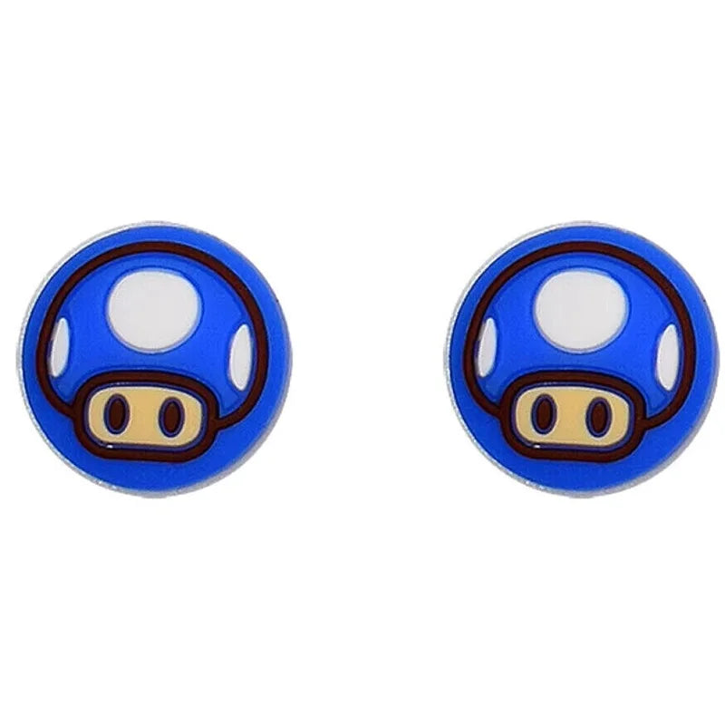 Pair of blue mushroom-shaped earrings on a white background