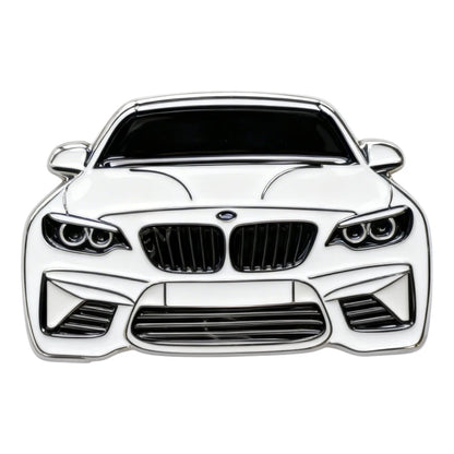 Metallic car emblem on a white background