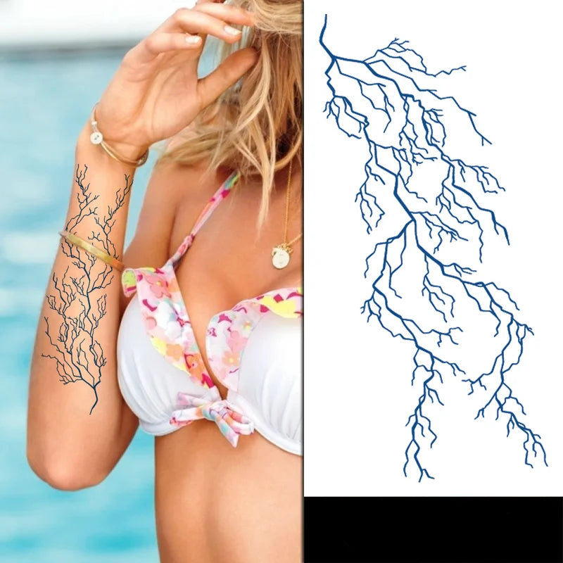 Woman with temporary tattoo of seaweed design by poolside, with tattoo outline 