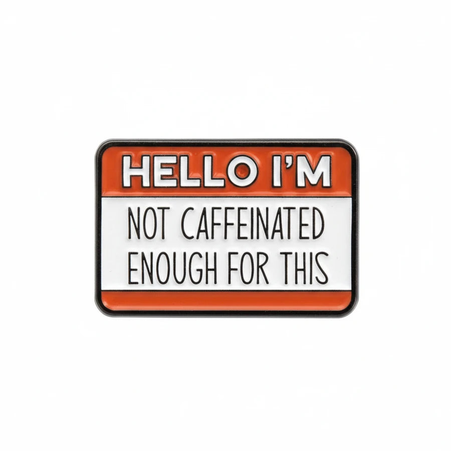 Name tag with text 'HELLO I'M NOT CAFFEINATED ENOUGH FOR THIS' on a white background