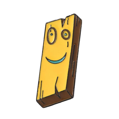 A novelty enamel pin shaped like a smiling yellow wood block or plank with a brown side and face details, shown on a plain white background.