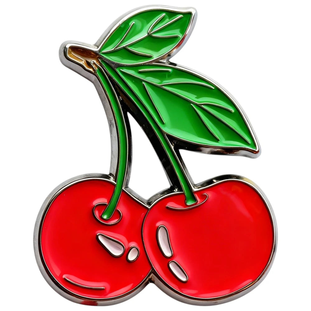 Enamel pin of two cherries with green stems and leaves on a white background