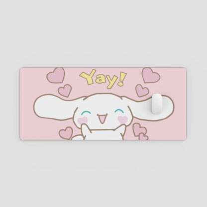 pink desk mat with cute design on