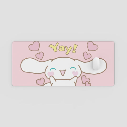 pink desk mat with cute design on