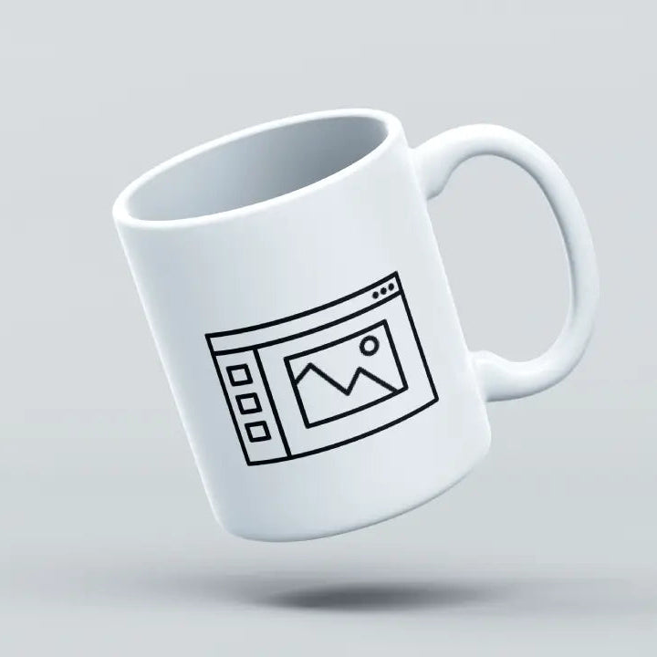 A white ceramic mug with a custom graphic design, depicting a web page with a camera icon, shown in mid-air against a grey background.
