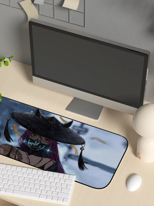 Desk setup with a computer monitor, keyboard, and mouse on a desk with a decorative japanese cyberpunk samurai mouse pad.