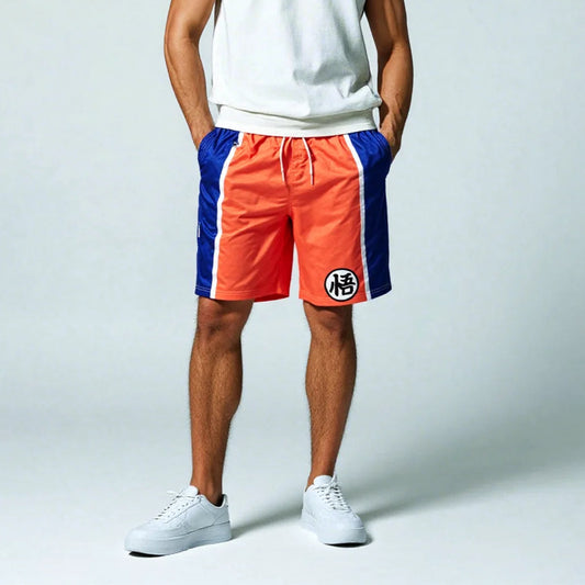 Man wearing a white tank top and red and blue shorts on a light gray background