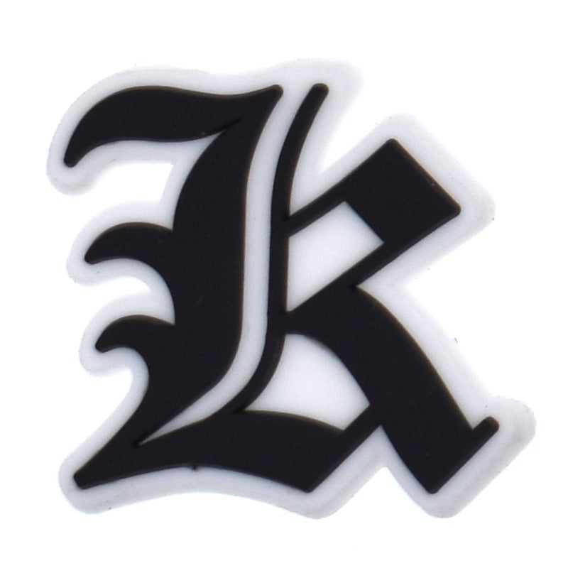 Black letter 'K' on a white background