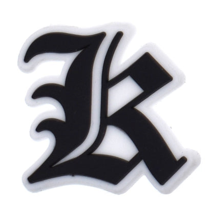 Black letter 'K' on a white background