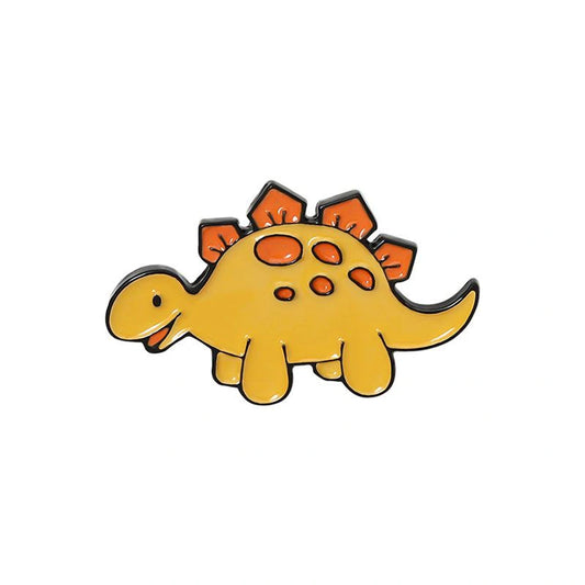 Yellow dinosaur-shaped pin with orange spikes on a white background