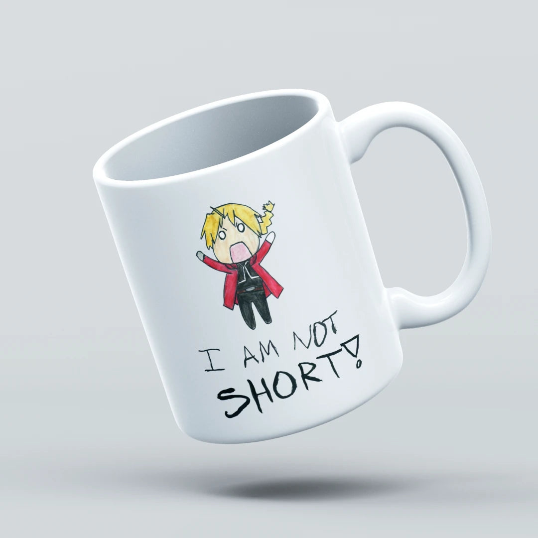 White mug with a cartoon character and text 'I AM NOT SHORT!' on a light gray background