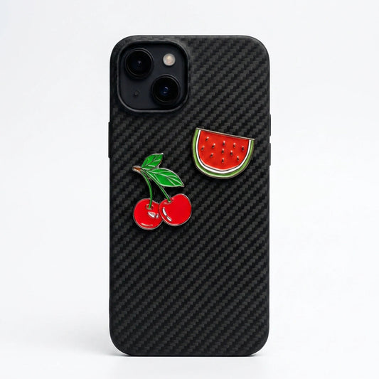 Black carbon fiber phone case with cherry and watermelon designs on a white background