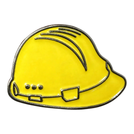 Yellow hard hat pin on a white background