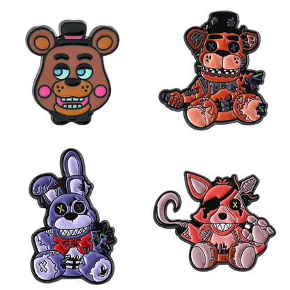 Four cartoon character pins with distinct colors and designs on a white background