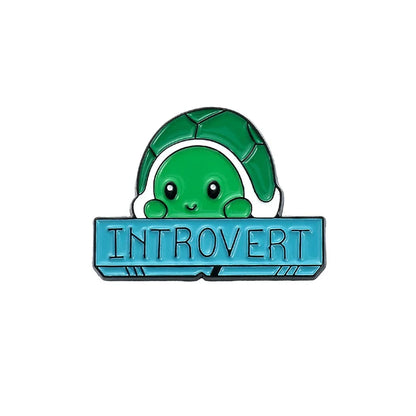 turtle hiding in shell with introvert as text enamel pin