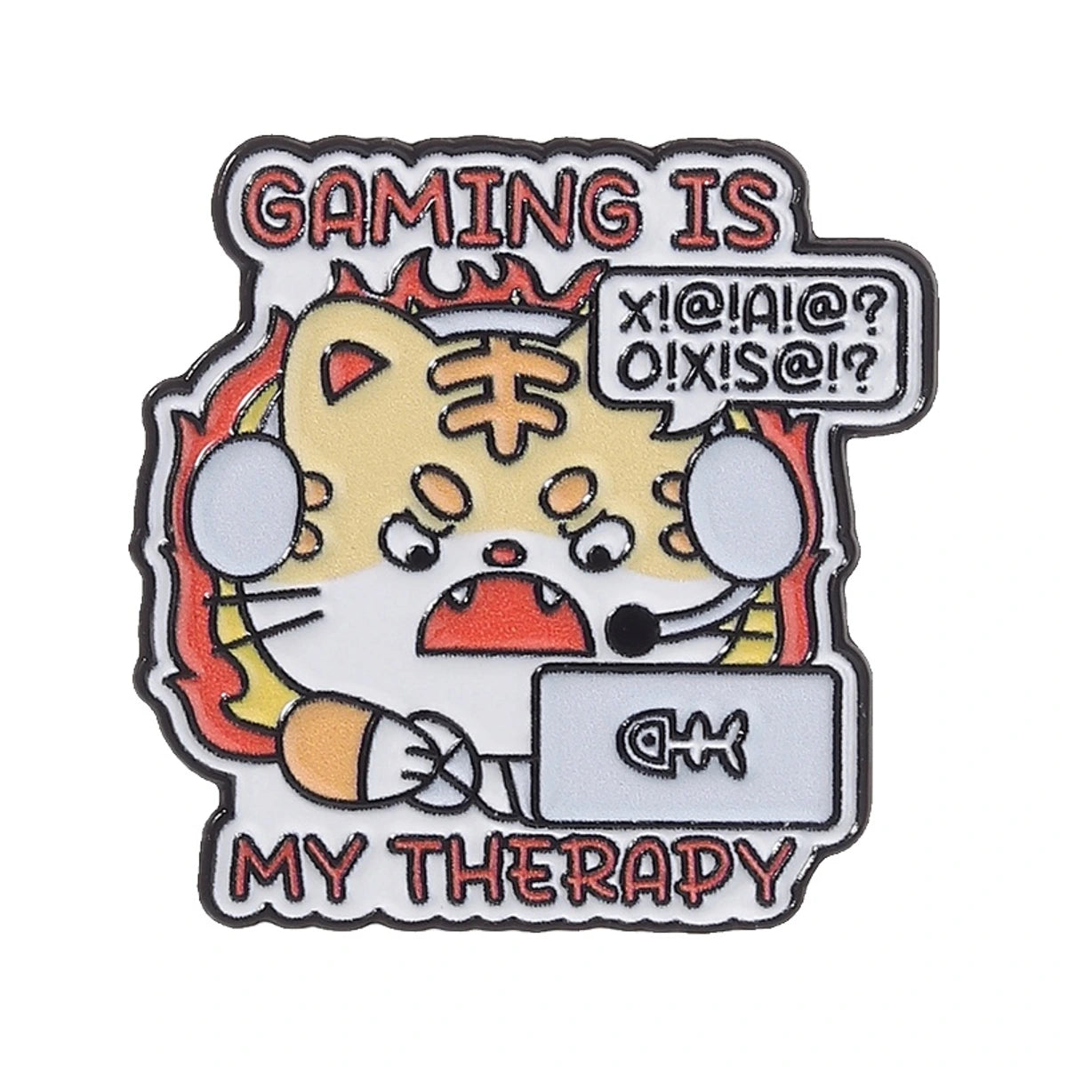 A die-cut enamel pin featuring a cartoon tiger wearing gaming headphones and looking at a computer monitor, with the text 'GAMING IS MY THERAPY' and a speech bubble reading 'XIO!AIO? OXIS@!?'.