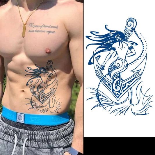 Person with a tattoo of a warrior on an anchor design