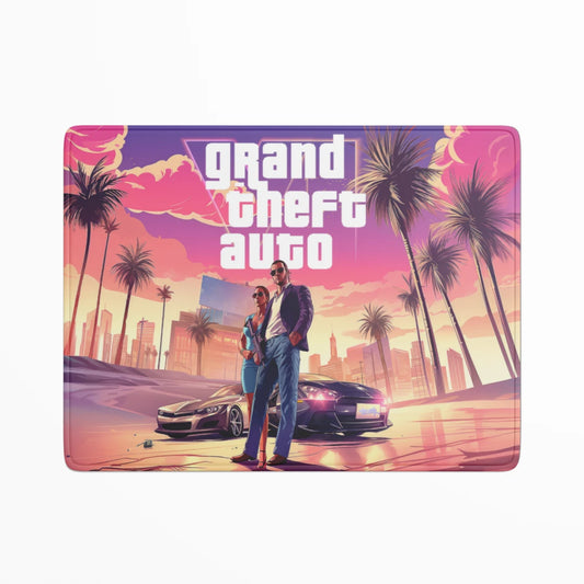 Grand Theft Auto-themed mouse pad with two characters and a car on a palm tree-lined street.