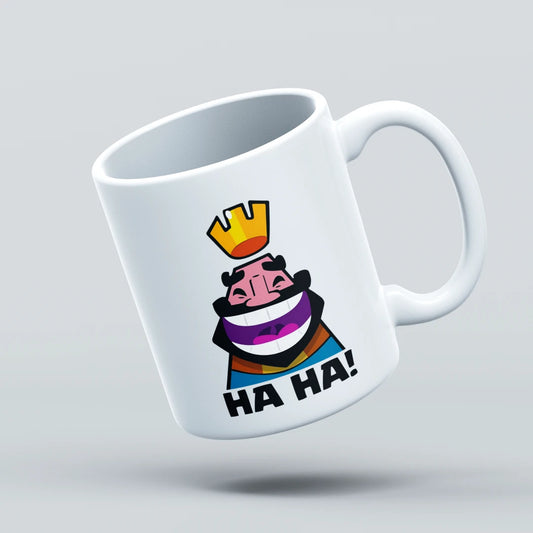White mug with colorful graphic design and 'HA HA!' text on a light gray background