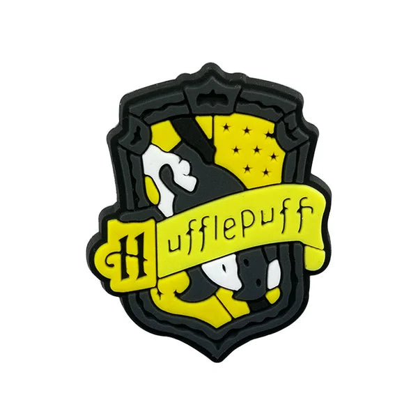 hufflepuff sigil croc charm design on a white background