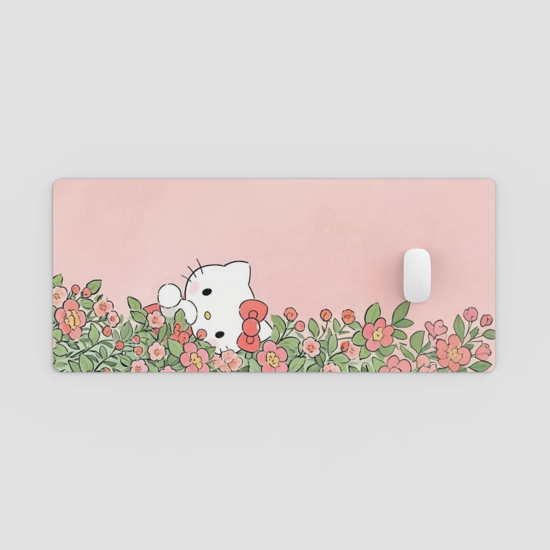 Pink mouse pad with cartoon character and floral design on a light gray background