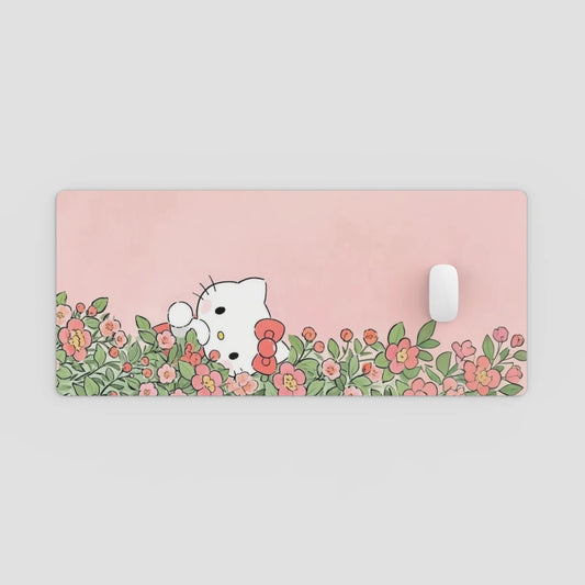 Pink mouse pad with cartoon character and floral design on a light gray background