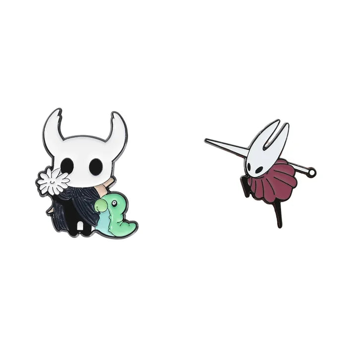 Two cartoon-style pins on a white background