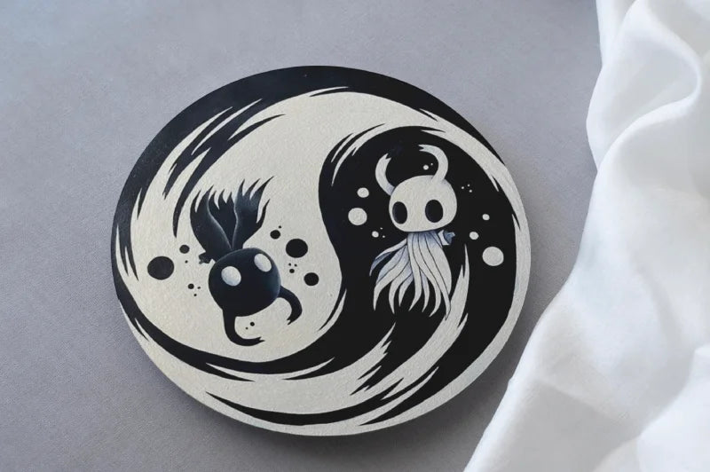 Yin and yang design with cartoon characters from hollow knight video game on a gray background